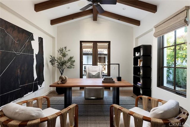 home office featuring vaulted ceiling with beams