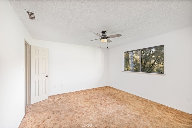 43317 Running Deer Ct, Coarsegold, CA 93614 - carpeted empty room featuring a ceiling fan, a textured ceiling, and baseboards