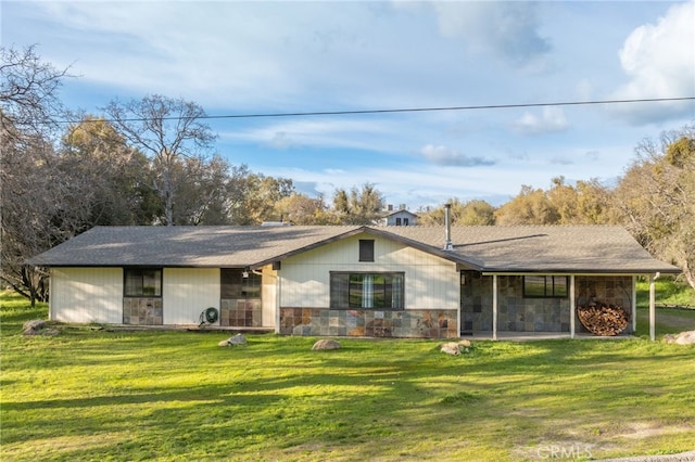 43317 Running Deer Ct, Coarsegold, CA 93614 - view of front facade featuring stone siding and a front yard