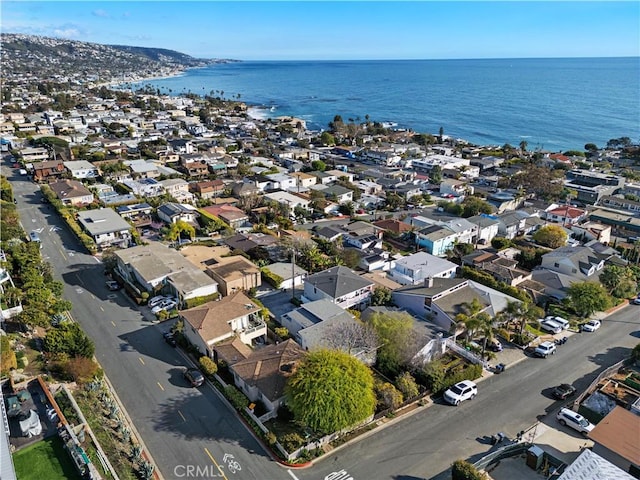 bird's eye view featuring a water view and a residential view