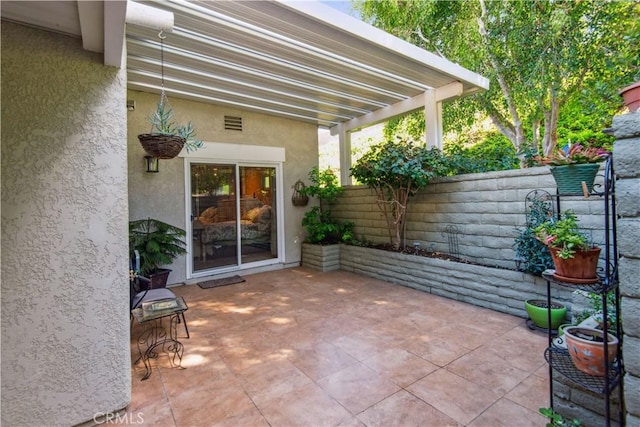view of patio with fence