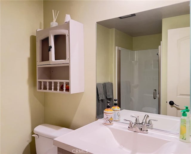 3001C Via Buena Vis Unit C, Laguna Woods, CA 92637 - bathroom featuring toilet, a stall shower, and vanity