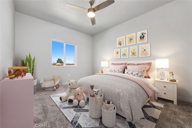 carpeted bedroom with a ceiling fan and baseboards