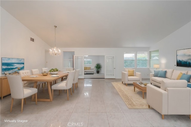 dining room with high vaulted ceiling, visible vents, a notable chandelier, and light tile patterned flooring