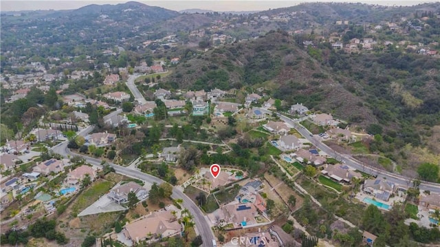 aerial view with a residential view and a mountain view