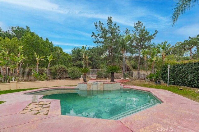 view of pool with a fenced in pool, a patio area, and a fenced backyard