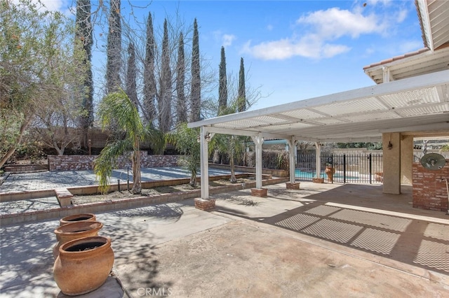 view of patio with fence and a pergola