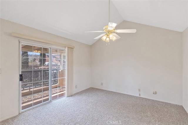 unfurnished room featuring carpet, vaulted ceiling, and ceiling fan