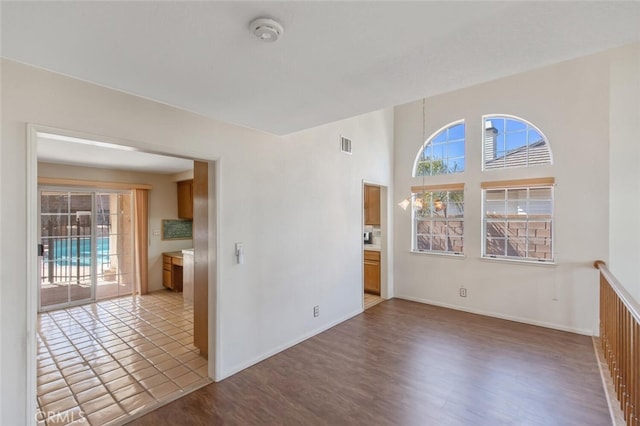 6118 Landau Pl, Quartz Hill, CA 93536 - spare room featuring a smoke detector and wood finished floors