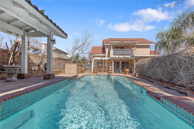 view of pool featuring a fenced in pool, a patio area, and fence