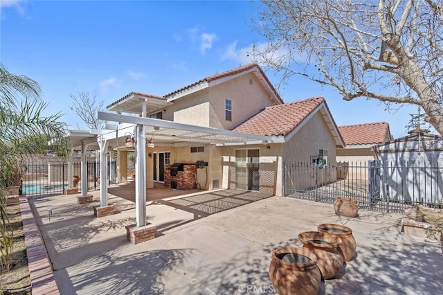 6118 Landau Pl, Quartz Hill, CA 93536 - rear view of property with stucco siding, a tiled roof, a patio area, and a pergola