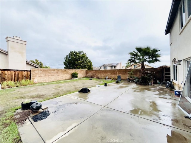 view of patio with a fenced backyard