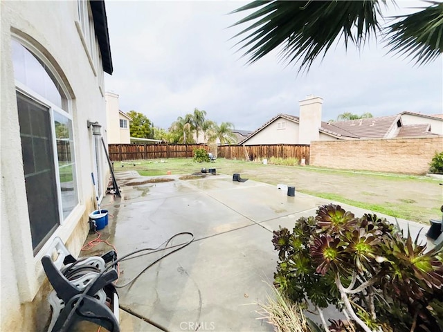 view of patio with a fenced backyard