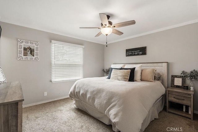 carpeted bedroom with crown molding, baseboards, and ceiling fan