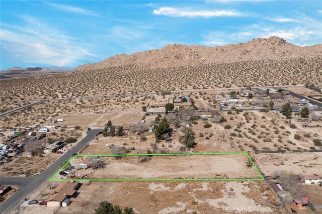 property view of mountains with view of desert and a rural view