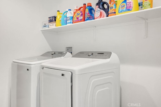 laundry area featuring laundry area and washer and dryer