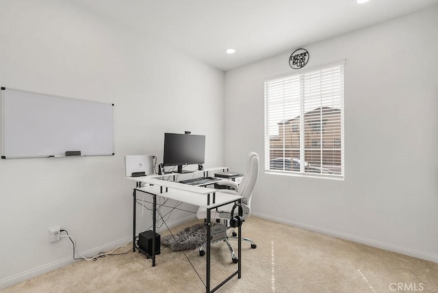 carpeted office with recessed lighting and baseboards