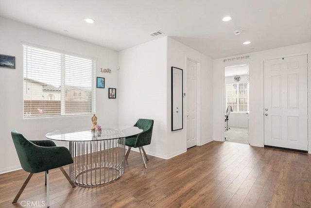 dining space featuring recessed lighting, visible vents, plenty of natural light, and wood finished floors