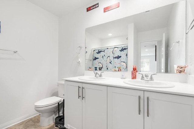 bathroom with toilet, double vanity, a sink, and a shower with shower curtain