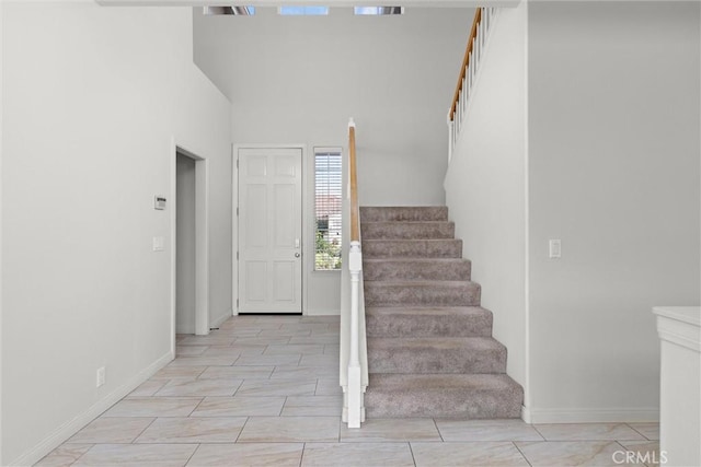 staircase with baseboards