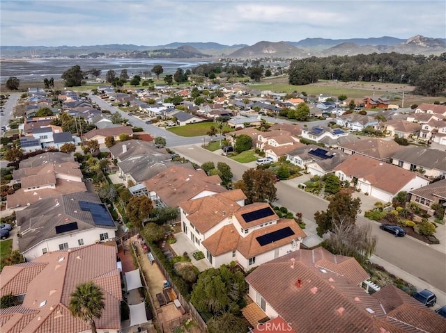 drone / aerial view with a residential view and a mountain view