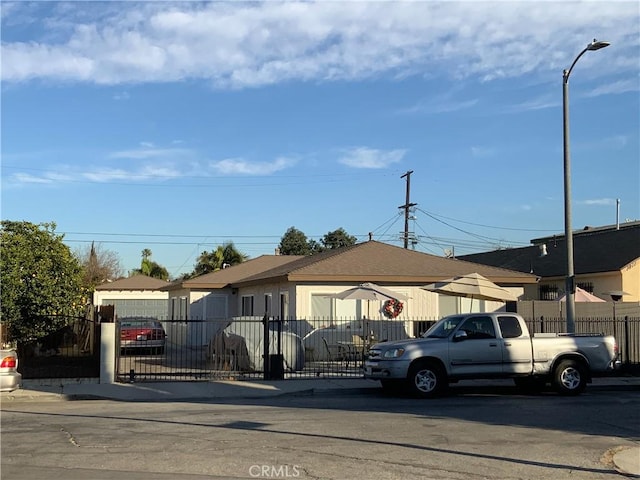 view of front of home with fence