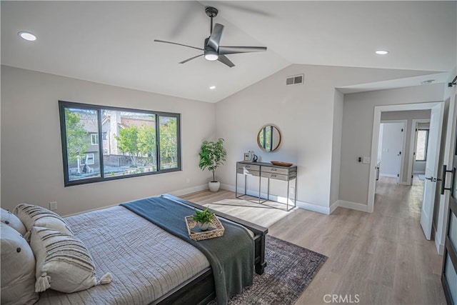 bedroom featuring baseboards, visible vents, lofted ceiling, light wood-style flooring, and recessed lighting