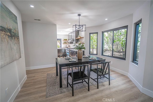 dining room featuring visible vents, recessed lighting, light wood-type flooring, and baseboards