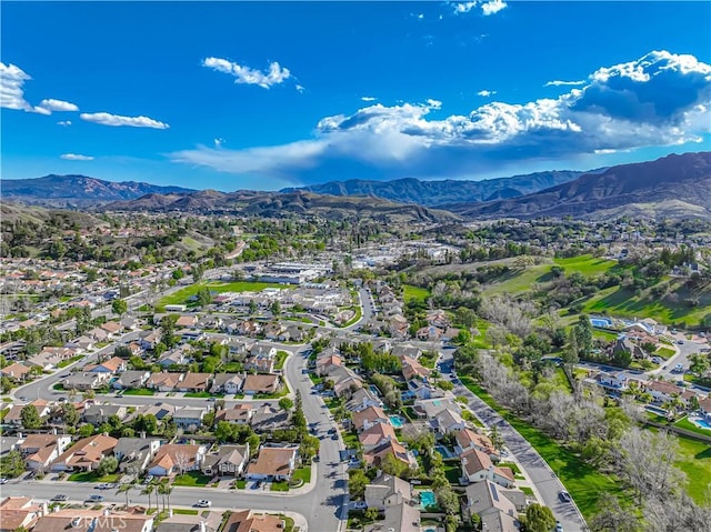 bird's eye view featuring a mountain view and a residential view