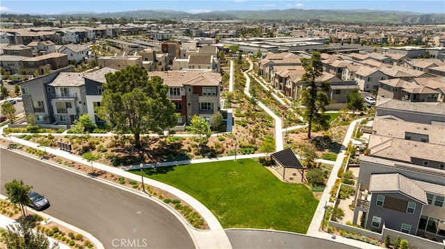 birds eye view of property featuring a mountain view and a residential view