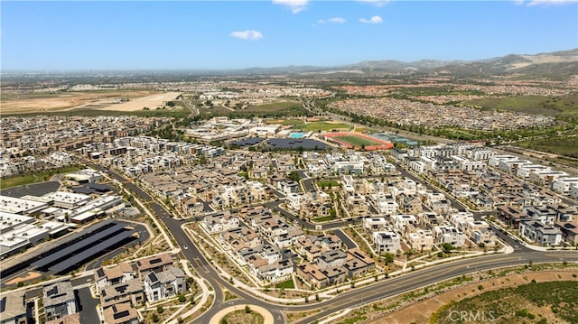 drone / aerial view with a mountain view and a residential view
