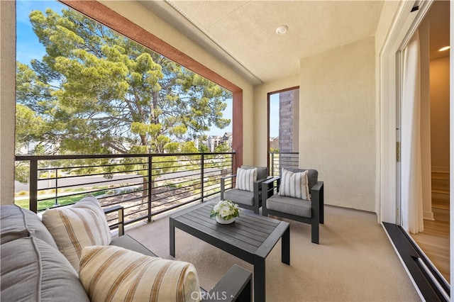 balcony featuring outdoor lounge area