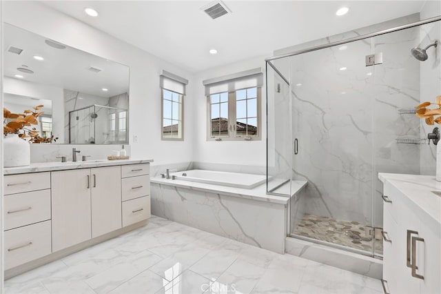 bathroom with vanity, visible vents, a marble finish shower, a bath, and marble finish floor