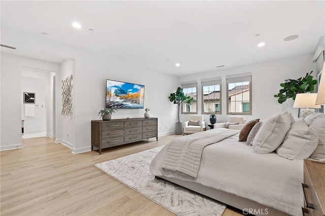 bedroom featuring recessed lighting, visible vents, baseboards, and light wood-style flooring