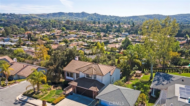 bird's eye view with a mountain view and a residential view