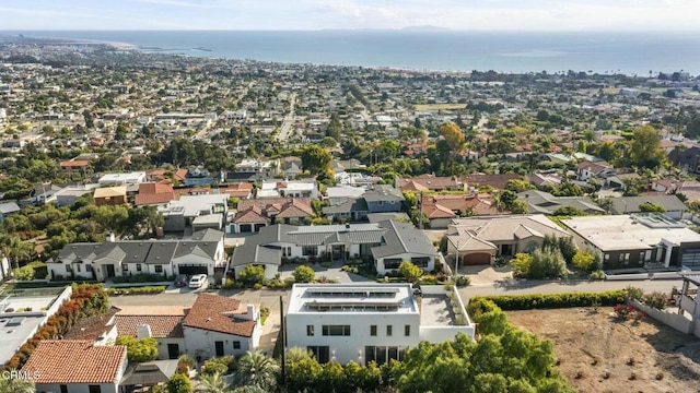 aerial view featuring a water view and a residential view