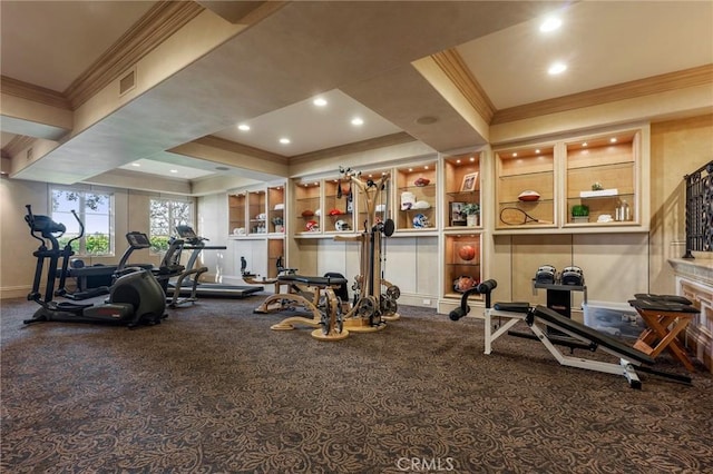 workout area with baseboards, carpet flooring, visible vents, and crown molding