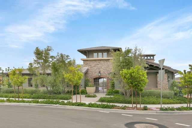 view of front of property featuring stone siding