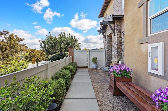 view of yard with a gate and fence