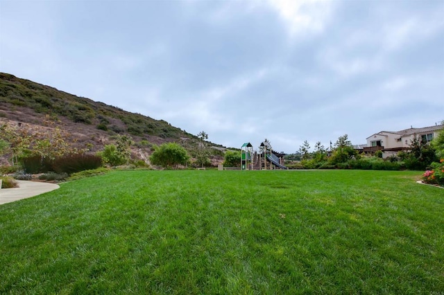 view of yard with a playground