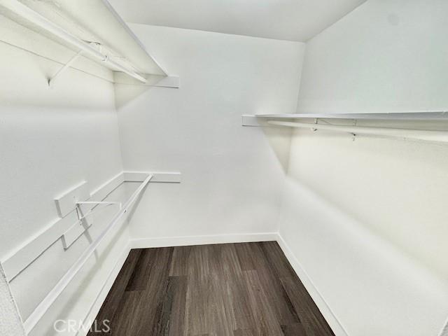 3601 W Hidden Ln Unit 309, Rolling Hills Estates, CA 90274 - spacious closet featuring dark wood-style flooring