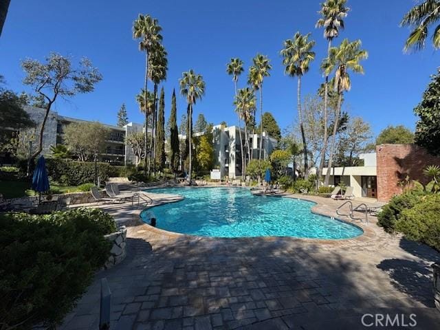 community pool featuring a patio