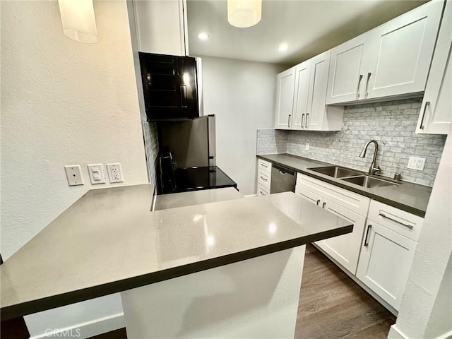 3601 W Hidden Ln Unit 309, Rolling Hills Estates, CA 90274 - kitchen featuring a sink, backsplash, white cabinets, and recessed lighting