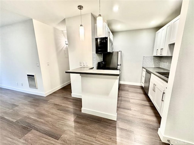 3601 W Hidden Ln Unit 309, Rolling Hills Estates, CA 90274 - kitchen with dishwasher, backsplash, dark wood finished floors, white cabinets, and dark countertops