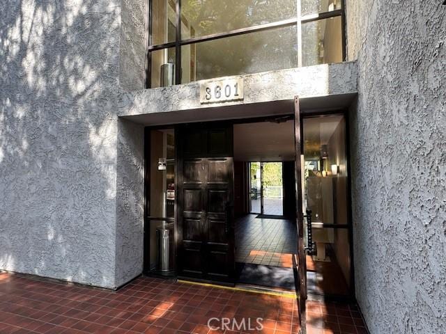 3601 W Hidden Ln Unit 309, Rolling Hills Estates, CA 90274 - view of exterior entry with stucco siding