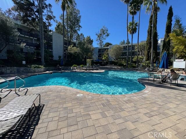 community pool featuring a patio