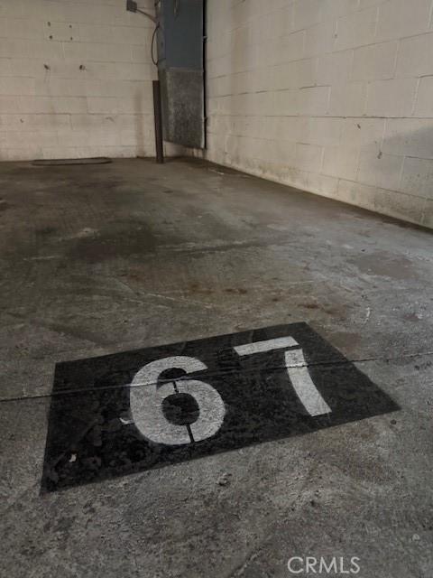 3601 W Hidden Ln Unit 309, Rolling Hills Estates, CA 90274 - garage featuring concrete block wall