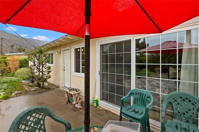 view of patio with a mountain view