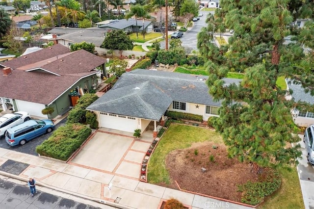 birds eye view of property with a residential view