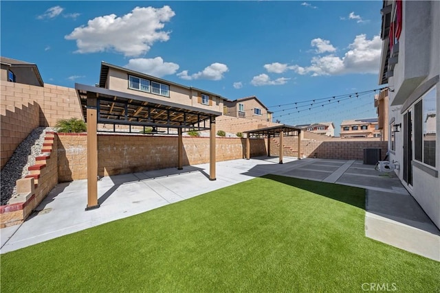 view of yard with a patio, cooling unit, a fenced backyard, and a pergola